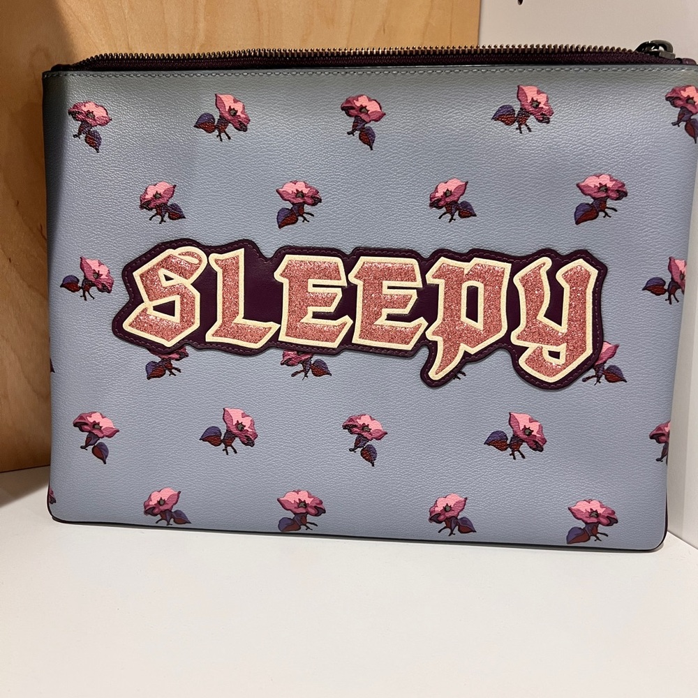 Coach Blue Floral Wristlet with 'Sleepy' Motif
